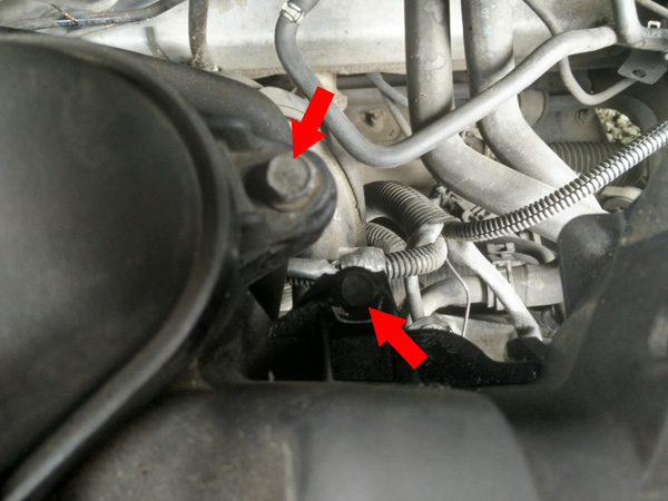 Remove rear right bolts from the top housing